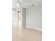 Neutrally painted bedroom with tile flooring, doorway, and ample space for furnishings at 9262 Sw 102Nd Avenue Rd, Ocala, FL 34481