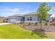 Charming single-story home with well-manicured lawn and a two-car garage at 9262 Sw 102Nd Avenue Rd, Ocala, FL 34481