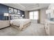 Serene main bedroom featuring a tray ceiling, plush carpet, and soothing neutral color palette for relaxation at 1310 Whispering Ln, Minneola, FL 34715