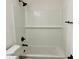 Recently remodeled bathroom with modern tub, fixtures, and subway tile shower, for a spa-like experience at 232 Thomas Ave, Frostproof, FL 33843
