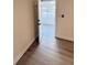 Bedroom featuring new floors and a large window with a scenic view at 232 Thomas Ave, Frostproof, FL 33843