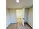 Spacious bedroom with wood floors and a doorway to another room at 232 Thomas Ave, Frostproof, FL 33843