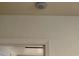 View of smoke detector on ceiling above doorway in home interior at 232 Thomas Ave, Frostproof, FL 33843