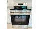 Stainless steel Frigidaire stove and oven complete the modern kitchen at 232 Thomas Ave, Frostproof, FL 33843