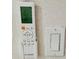 Image shows a BOSCH thermostat attached to the wall along with a standard switch plate at 232 Thomas Ave, Frostproof, FL 33843