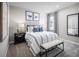 Comfortable bedroom with a queen-sized bed, soft lighting, and stylish decor for relaxation at 3758 Voyageurs Ct, Apopka, FL 32712