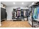 Walk-in closet with modern organization system at 13700 Sw 108Th Ln, Dunnellon, FL 34432