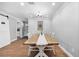 Traditional dining room with a large table, wooden floors, and elegant decor at 13700 Sw 108Th Ln, Dunnellon, FL 34432