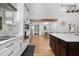 Open concept kitchen with long sightlines to the dining room, entrance, and living room at 13700 Sw 108Th Ln, Dunnellon, FL 34432