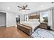 Spacious main bedroom featuring stylish wood accents and offering a comfortable and relaxing retreat at 13700 Sw 108Th Ln, Dunnellon, FL 34432