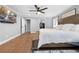 Well lit bedroom that includes walk-in closet and ensuite bathroom at 13700 Sw 108Th Ln, Dunnellon, FL 34432