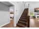 Staircase leading to open concept living space at 13700 Sw 108Th Ln, Dunnellon, FL 34432