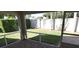 Enclosed patio overlooking a green backyard, providing a serene outdoor space at 3806 Osprey Pointe Cir, Winter Haven, FL 33884