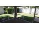 Screened patio with brick flooring and view of a lush, green backyard at 3806 Osprey Pointe Cir, Winter Haven, FL 33884