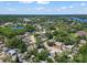 Expansive aerial view of a residential neighborhood with lush greenery, lakes and scenic views at 201 Lake Gene Dr, Longwood, FL 32779