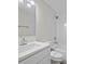 Newly renovated bathroom with white marble, sleek fixtures, and a stylish vanity providing a spa-like experience at 201 Lake Gene Dr, Longwood, FL 32779