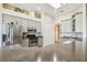 Kitchen features stainless steel appliances, granite counters, and breakfast nook with abundant light at 27223 Nostalgia Dr, Leesburg, FL 34748