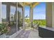 Charming patio with seating area and views of nature outside at 27223 Nostalgia Dr, Leesburg, FL 34748
