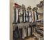 Organized walk-in closet with metal shelving providing ample storage for clothing and accessories at 27223 Nostalgia Dr, Leesburg, FL 34748