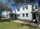 Charming two-story townhome with a well-manicured lawn and beautiful landscaping, perfect for comfortable living at 3309 Grande Heron Dr, St Cloud, FL 34773