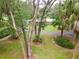 Aerial shot of the landscaped property with a circular driveway at 3341 Se 45Th St, Ocala, FL 34480