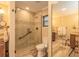 Bathroom with glass enclosed shower, tile surround and flooring, toilet, and vanity at 3341 Se 45Th St, Ocala, FL 34480