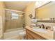 Bathroom featuring glass shower, granite countertop vanity, decorative mirror, and toilet at 3341 Se 45Th St, Ocala, FL 34480