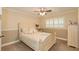 Cozy bedroom featuring a ceiling fan and plantation shutters offering natural light at 3341 Se 45Th St, Ocala, FL 34480