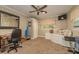 Bedroom featuring carpet floors, work space, cushioned seating, and natural light at 3341 Se 45Th St, Ocala, FL 34480