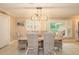 Bright dining area featuring woven chairs and natural light at 3341 Se 45Th St, Ocala, FL 34480