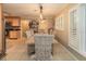 Inviting dining room with a modern light fixture and woven chairs at 3341 Se 45Th St, Ocala, FL 34480