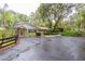 Charming home featuring a well-manicured yard, covered parking, and a welcoming entrance, seamlessly blending comfort and style at 3341 Se 45Th St, Ocala, FL 34480
