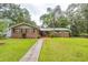 Charming exterior of home featuring a green lawn, brick and siding, and well-maintained landscaping at 3341 Se 45Th St, Ocala, FL 34480