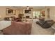 A spacious living room features a fireplace, ample seating, and modern decor at 3341 Se 45Th St, Ocala, FL 34480