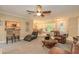 Open-concept living room featuring a dining area, kitchen, and comfortable seating at 3341 Se 45Th St, Ocala, FL 34480