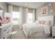 Cozy bedroom featuring a comfortable bed, dresser, and soft lighting, creating a relaxing retreat at 1278 Whispering Ln, Minneola, FL 34715