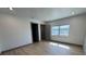 Bedroom with light-colored hardwood flooring, neutral paint, and modern recessed lighting at 2963 Poplar Ave, Leesburg, FL 34748