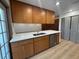 Modern kitchen featuring stainless steel appliances, sleek countertops, and ample cabinetry at 2963 Poplar Ave, Leesburg, FL 34748