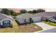 Charming single Gathering home with a two-car garage, a quaint front yard, and neutral paint at 8471 Clearway Dr, Wildwood, FL 34785