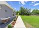 Charming single-story home with a well-manicured lawn, walkway, and inviting curb appeal at 9783 Sw 206Th Court Rd, Dunnellon, FL 34431
