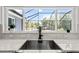 Kitchen window with a view of the pool and backyard at 9783 Sw 206Th Court Rd, Dunnellon, FL 34431