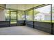 Enclosed outdoor patio, perfect for enjoying the outdoors in a bug-free zone at 10859 William And Mary Ct, Orlando, FL 32821