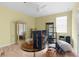 Cluttered bedroom with personal items and furniture, needing decluttering and staging at 1382 Heritage Landings Dr, Lakeland, FL 33805