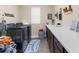 Functional laundry room with modern washer and dryer, storage cabinets, and laundry-themed decor at 1382 Heritage Landings Dr, Lakeland, FL 33805