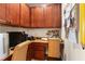 Home office space with custom wood cabinetry and a comfortable work area at 1382 Heritage Landings Dr, Lakeland, FL 33805