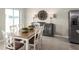 Elegant dining room with a large table, stylish chairs, and ample natural light at 1538 Landon Ln, Haines City, FL 33844