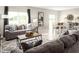 Comfortable living room with stylish furnishings and plenty of natural light streaming through large windows at 1538 Landon Ln, Haines City, FL 33844