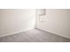 This bedroom features neutral walls and carpet, as well as a window with blinds at 4106 Nw 44 Cir, Ocala, FL 34482