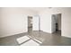 Spacious bedroom with neutral walls, two entryways, and plenty of natural light at 4106 Nw 44 Cir, Ocala, FL 34482