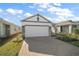 Charming home featuring a two-car garage and welcoming curb appeal at 4106 Nw 44 Cir, Ocala, FL 34482